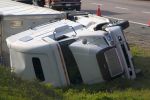 Truck accidents on the side of a highway.